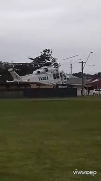 Toll rescue helicopter flying to Liverpool hospital after a crash at Unanderra. Video by Dan Rowlands.