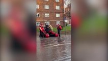 Londoners ferried across flooded road in rescue boat after water pipe burst