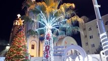 شاهد مجسمات مضيئة داخل وخارج كنائس المنيا تزامناً مع قداس عيد الميلاد المجيد
