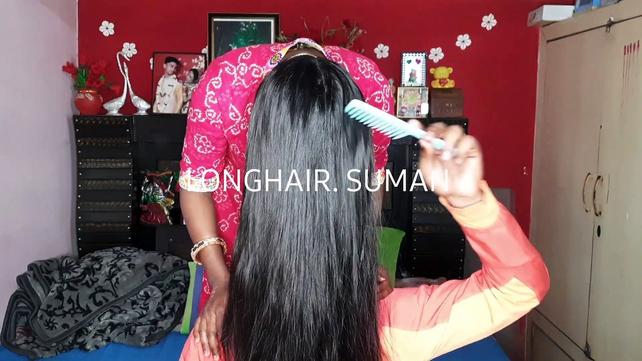 over face longhair smelling in romantic way by man .