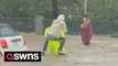 Huge dumpster and debris seen floating downstream as flash floods prompt mandatory evacuations in Santa Barbara, California