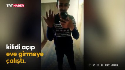 Hırsızı kapı deliğinden görüntüledi