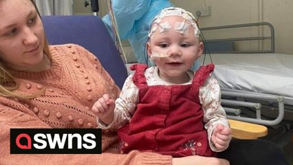 Amazing moment tot waves for the first time after mum told daughter would never walk or speak