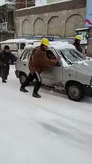 People struggle to drive in freezing temperature in Kashmir
