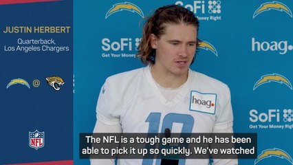 A showdown of playoff first-timers in Justin Herbert and Trevor Lawrence