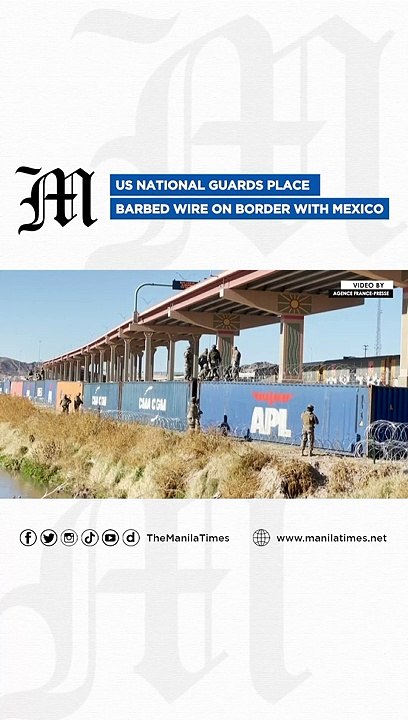US national guards place barbed wire on border with Mexico
