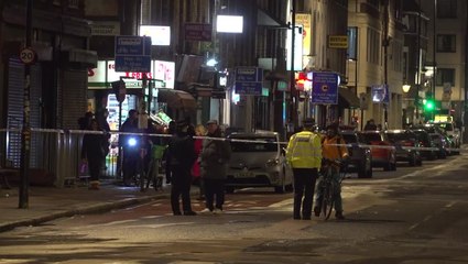 Police cordon drive-by shooting scene in London where girl, 7, and five others were injured