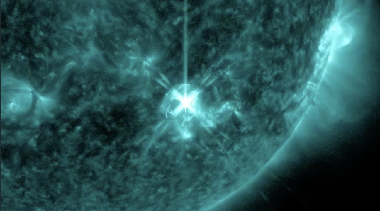 Double Solar M-Flares Blast Massive Coronal Mass Ejection