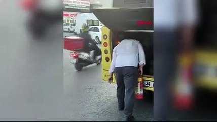 Otobüsün yanan motorunu üfleyerek söndürmeye çalıştı