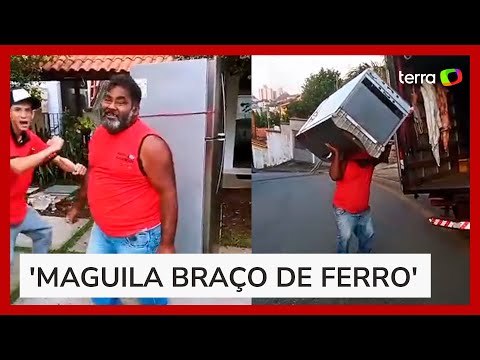 Homem viraliza nas redes sociais ao fazer passinho de funk com geladeira nas costas