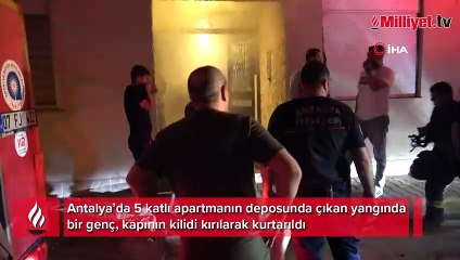 Antalya’da yangın paniği: Mahsur kalan genç, kapının kilidi kırılarak kurtarıldı