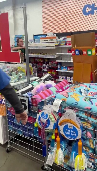 Security Retrieves Merchandise Amid Public Freakout