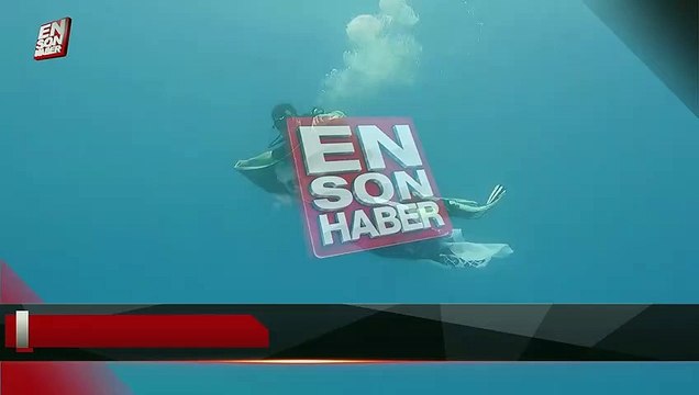 AK Partili meclis üyesi denizin altında Cumhurbaşkanı Erdoğan'ın posterini açtı