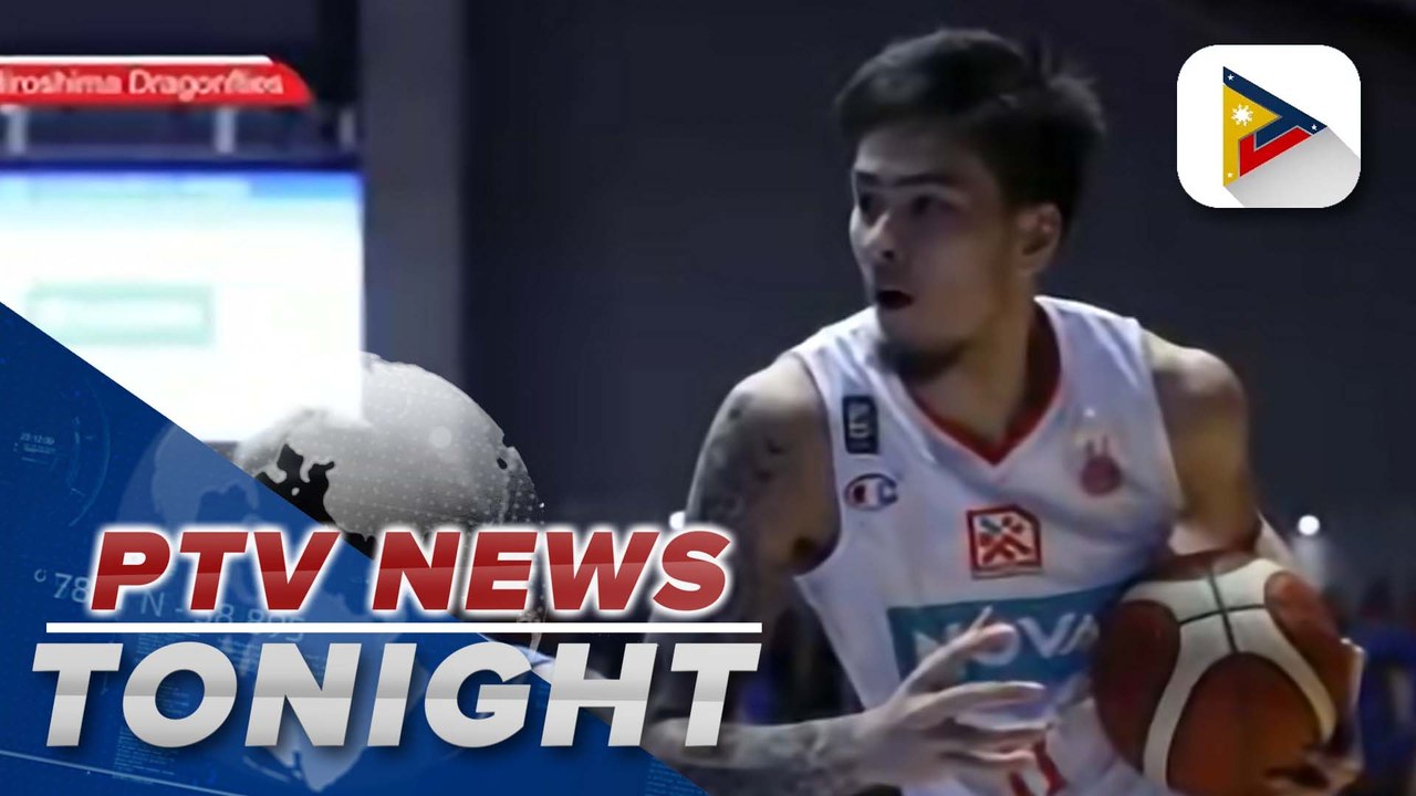 Dirk Nowitzki gives a piece of advice to Kai Sotto