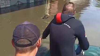 Ukrayna'da sel basan yerlerde kurtarma çalışmalarında binden fazla kişiye tahliye