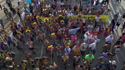 Indigenous people in Brazil march ahead of trial over future of their lands