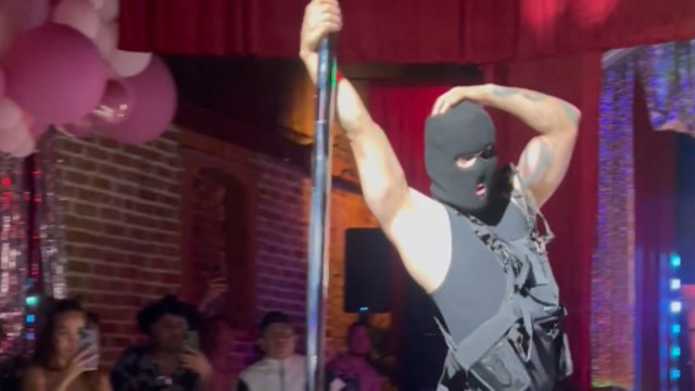 Male Pole Dancer sets alight the pole stage with his stunning moves