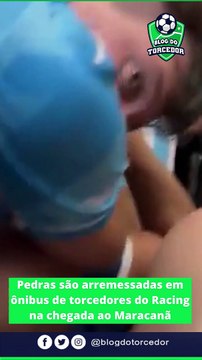 Pedras são arremessadas em ônibus de torcedores do RACING na chegada ao Maracanã