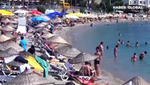 Sıcaklık 32 dereceyi gördü: Bodrum'da plajlar doldu taştı