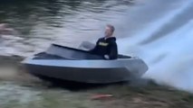 CRAZY STUNT as Man drives a boat onto the back of his trailer!