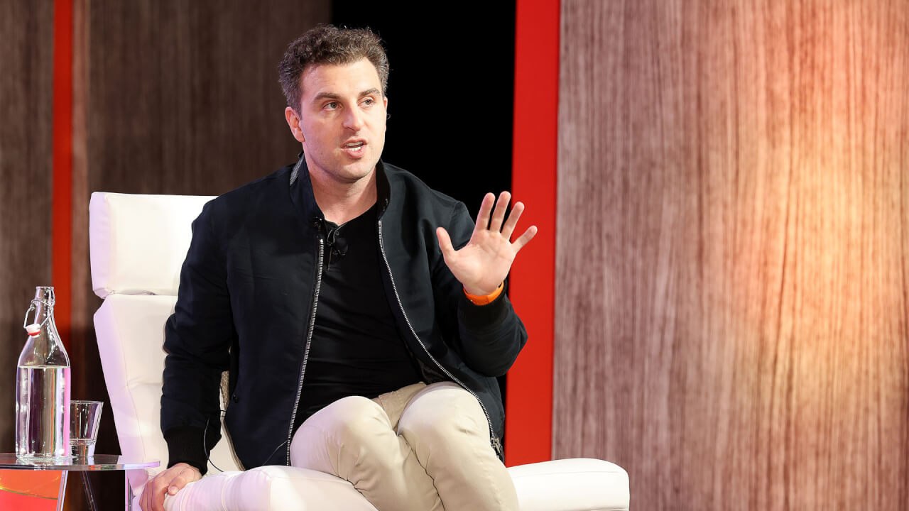 Amid tech layoffs, Airbnb CEO says "business is going really well"