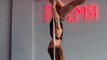 Woman Demonstrates Her Pole Dancing Moves