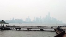Drone video shows iconic New York City skyline shrouded in smoke