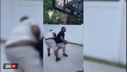 Video: Check out this driveway basketball dunk that gets ugly