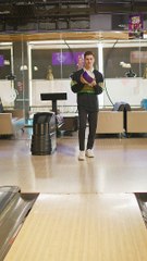 young-man-at-the-bowling-center-makes-a-shot-2