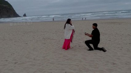Girl is proposed by her boyfriend at a beach *Heartfelt proposal reaction*