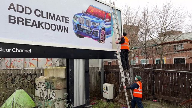 Climate activists hijack car adverts to highlight environmental impact