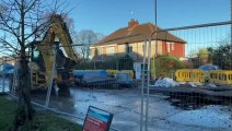 High pressure water main bursts and causes flooding in Moonshine Lane, Southey Green