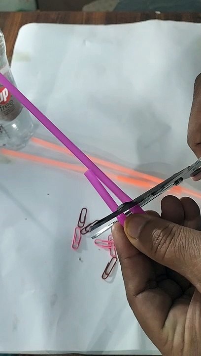 paper clip and straw trick.