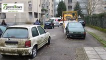 Peschiera Borromeo, rimosse cinque carcasse d'auto dal parcheggio delle case Aler di via Matteotti