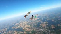 Group of Skydivers Perform Amazing Tricks in Sky During Skydiving Championship