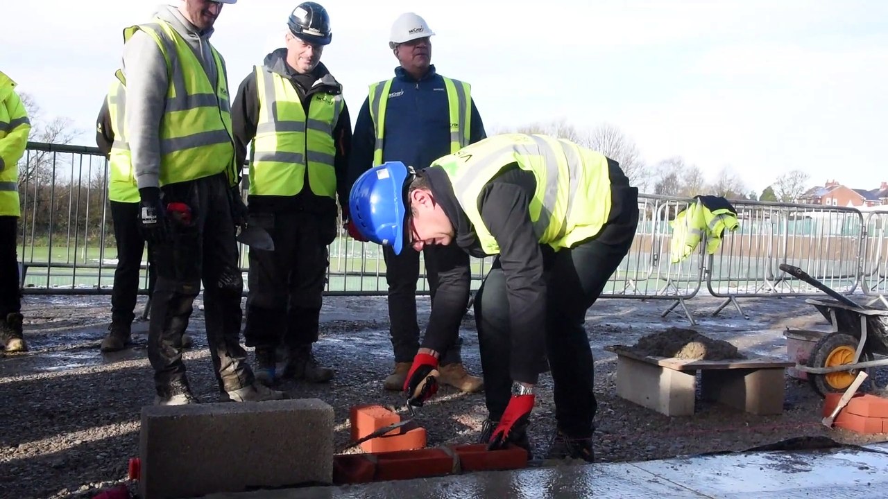 Andy Burnham attends ceremony for new school building