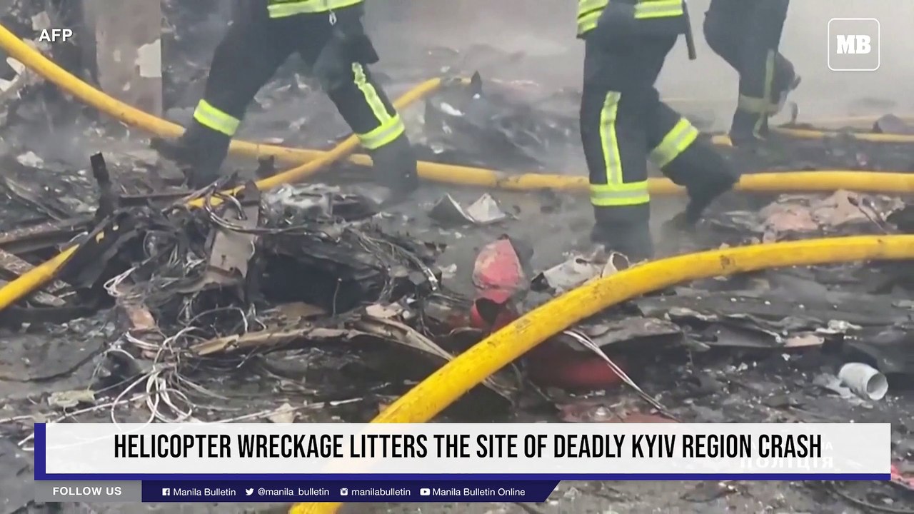 Helicopter wreckage litters the site of deadly Kyiv region crash