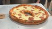Trying a viral pizza bagel in NYC