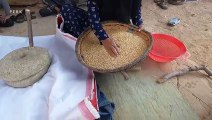 Grinding Wheat with Grinding Stone _ Nomadic Lifestyle of Iran