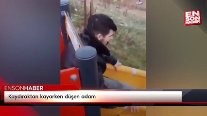 Kaydıraktan kayarken düşen adam