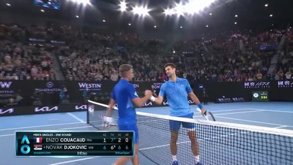 Tải video: Djokovic overcomes hecklers to see off Couacaud