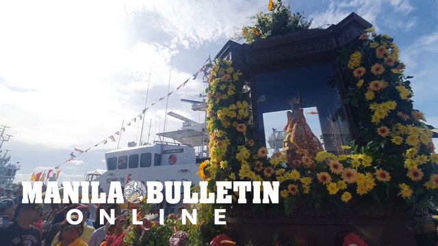 Thousands of devotees join the procession of the image of Sto. Nino de Cebu in Iloilo City