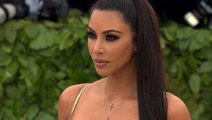 Kim Kardashian Says She’s In Her ‘Happy Era’ As She Blows Kisses In Sexy New Pics