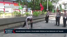 Jalan Rusak Parah, Polisi Beri Peringatan dengan Cat Jalan