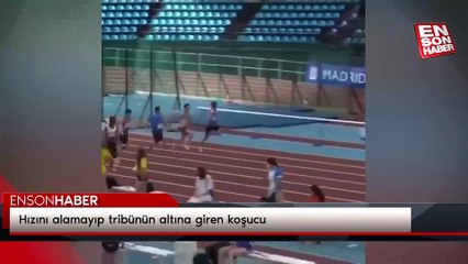 Hızını alamayıp tribünün altına giren koşucu
