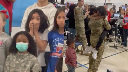 Girl Sprints From School Play When Surprised by Military Mom