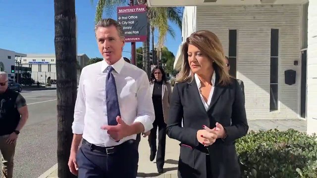 California Governor Newsom surrounded by armed security