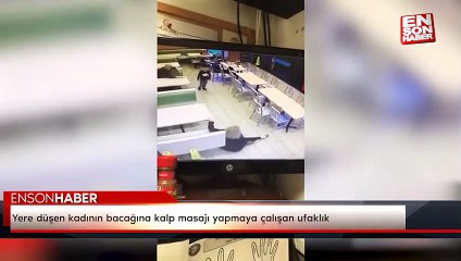 Yere düşen kadının bacağına kalp masajı yapmaya çalışan ufaklık