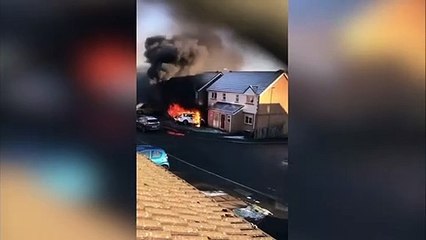 Dramatic fire as car ablaze on driveway
