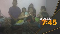 Banjir | Bapa lima anak kendong anak OKU harungi banjir